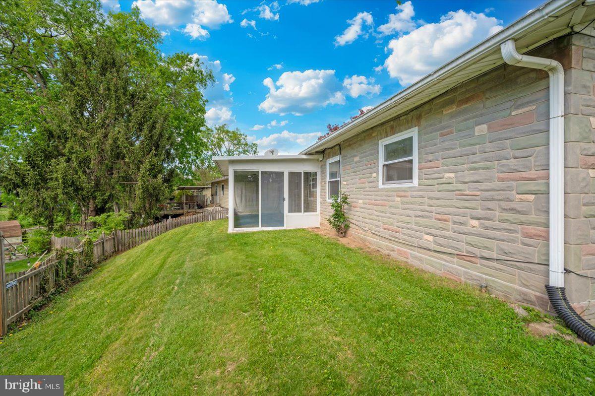 207 Barbara Street Frederick, MD 21701 - Photo 36 of 46 a view of backyard of house with green space