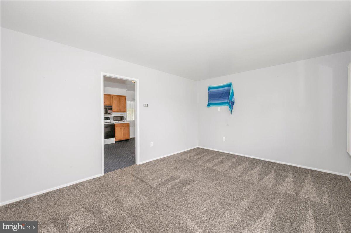 207 Barbara Street Frederick, MD 21701 - Photo 7 of 46 an empty room with closet