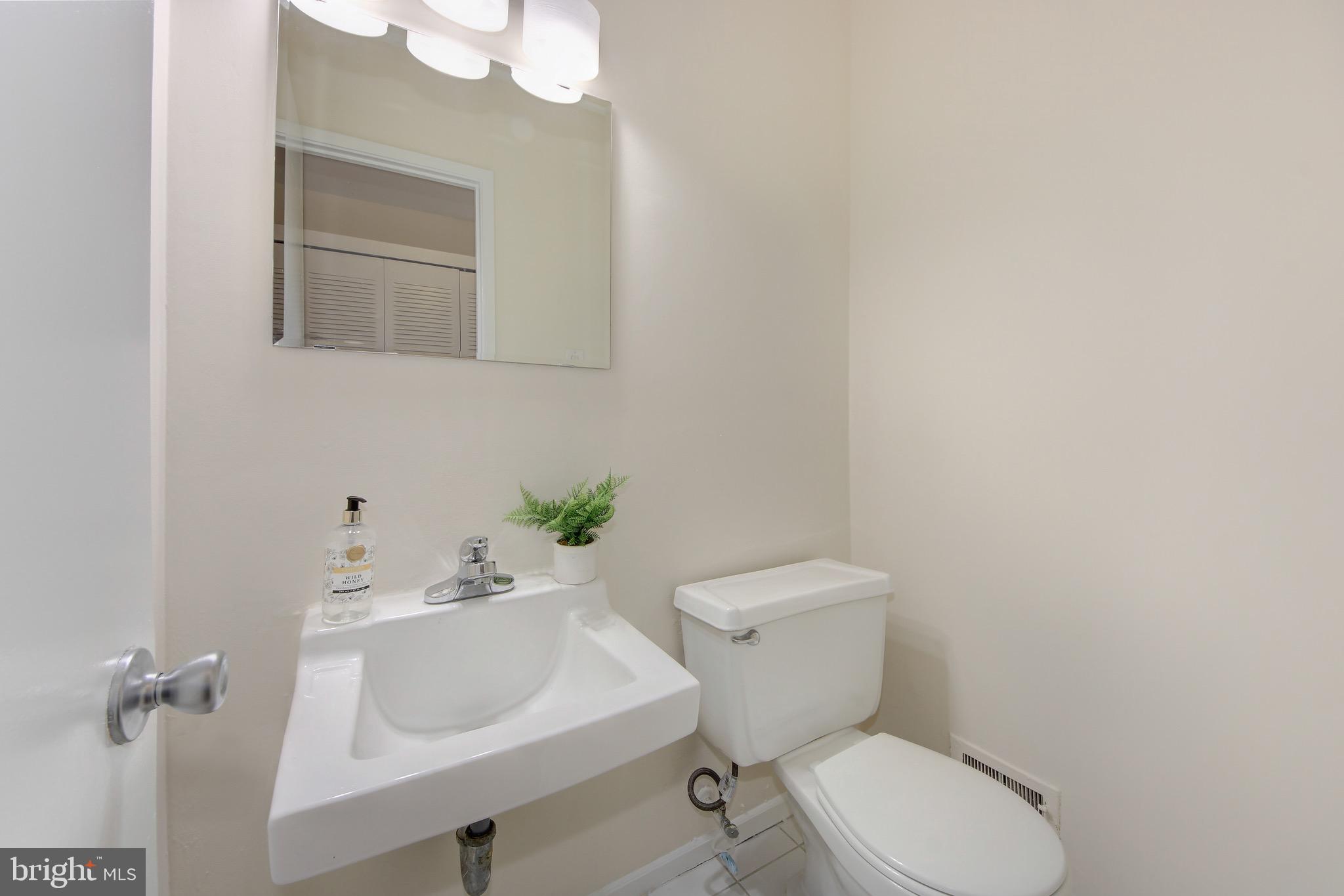395 O Street Southwest Washington, DC 20024 - Photo 14 of 44 Powder room on main level, tucked away for privacy