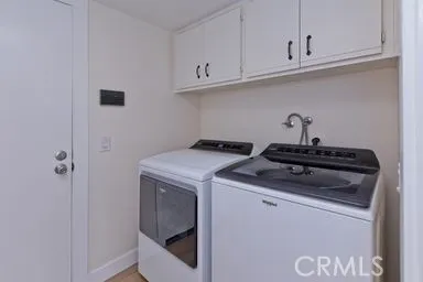 a kitchen with a stove and a sink