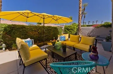 a building outdoor space with patio furniture