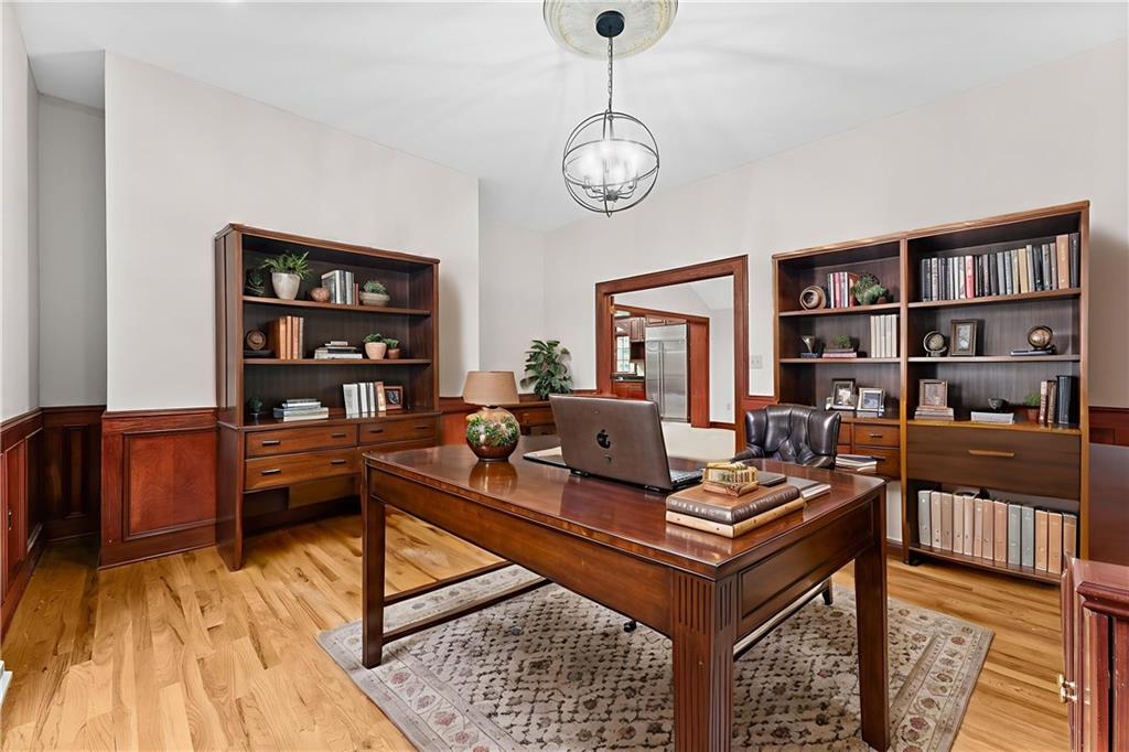 1060 Fox Chapel Road Pittsburgh, PA 15238 - Photo 22 of 50 Quiet first-floor office with hardwood floors and custom built-in shelving