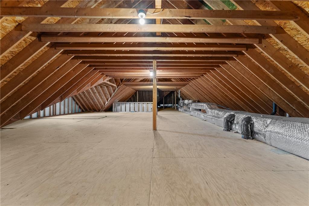 1060 Fox Chapel Road Pittsburgh, PA 15238 - Photo 40 of 50 Unfinished third floor with staircase access from the second-floor hallway—offering exceptional potential for future living space.