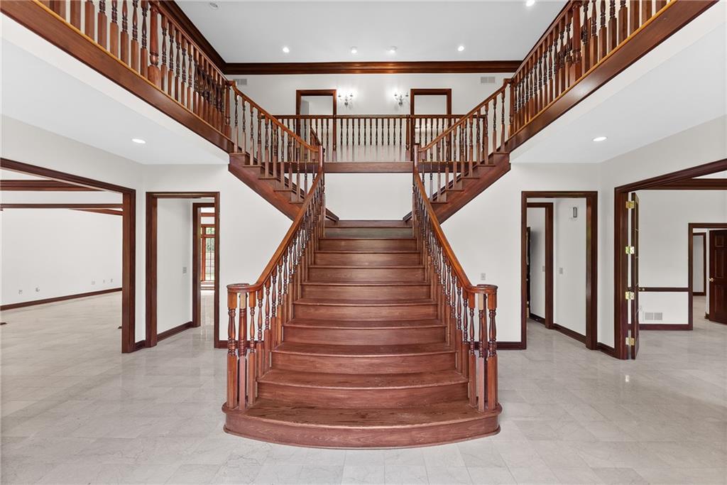 1060 Fox Chapel Road Pittsburgh, PA 15238 - Photo 7 of 50 Grand two-story foyer with sweeping split staircase and open second-floor overlook