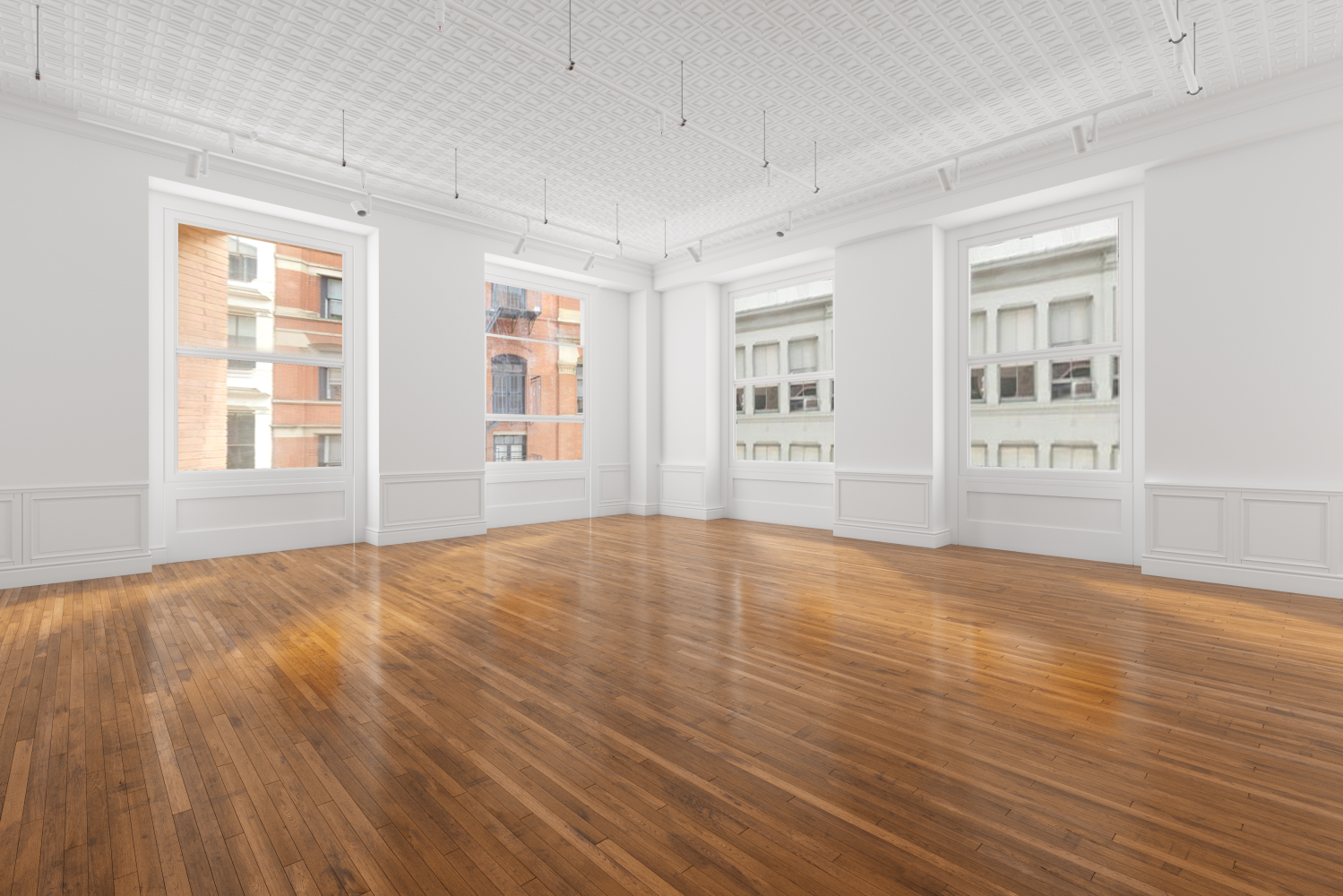 59 Wooster Street, Unit 3 Manhattan, NY 10012 - Photo 3 of 9 a view of an empty room with wooden floor and a window
