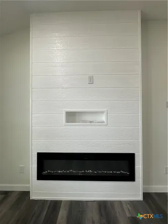 a bathroom with a sink and shower