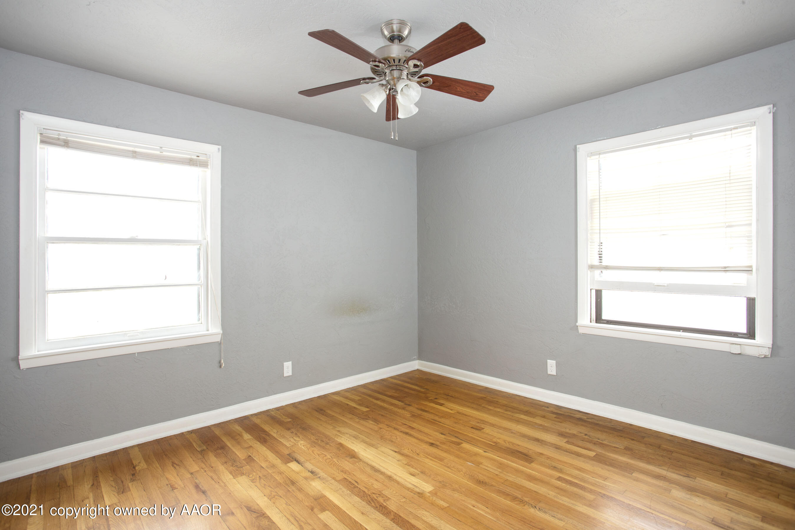 4312 South Monroe Street Amarillo, TX 79110 - Photo 9 of 18 a view of an empty room with a window