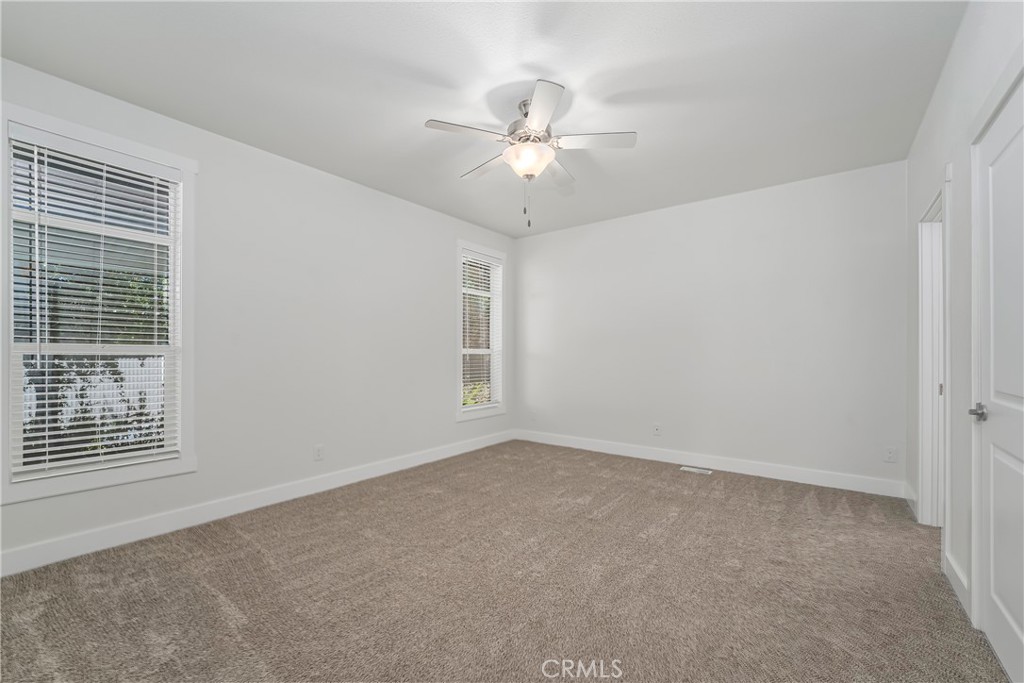 1120 East Mission Road, Unit 57 Fallbrook, CA 92028 - Photo 13 of 25 a view of an empty room with a window