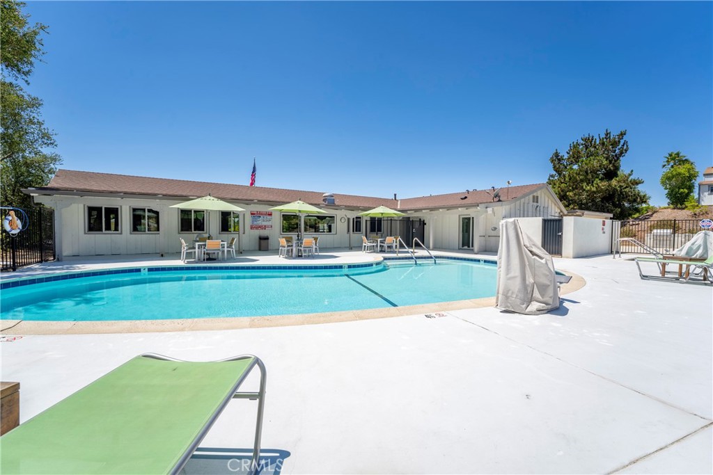 1120 East Mission Road, Unit 57 Fallbrook, CA 92028 - Photo 19 of 25 a view of house with outdoor seating