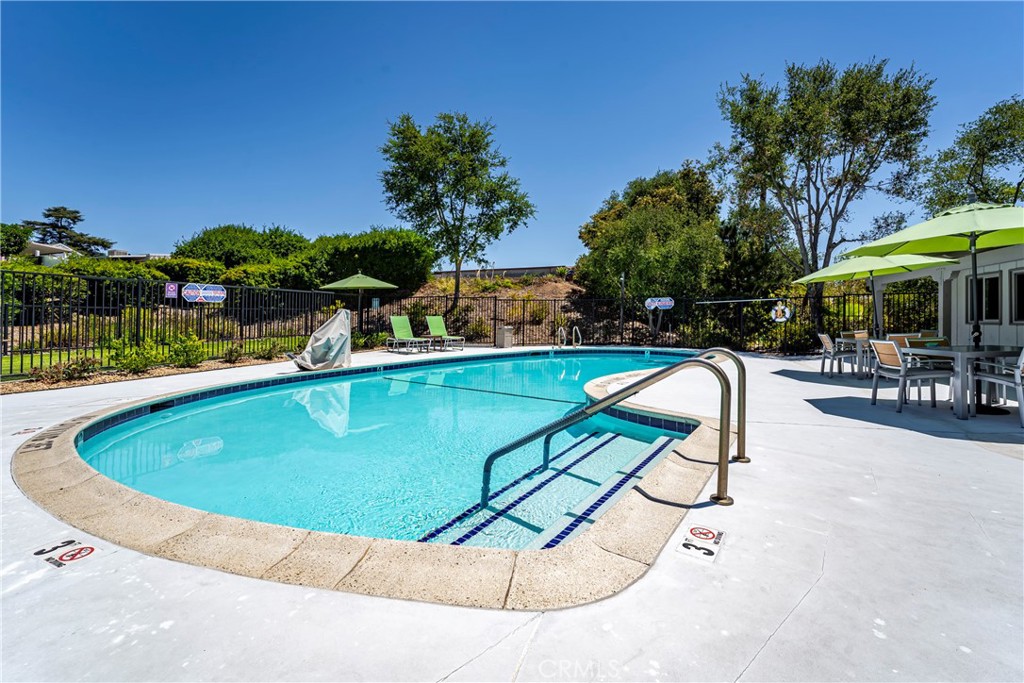 1120 East Mission Road, Unit 57 Fallbrook, CA 92028 - Photo 23 of 25 a view of swimming pool with chairs