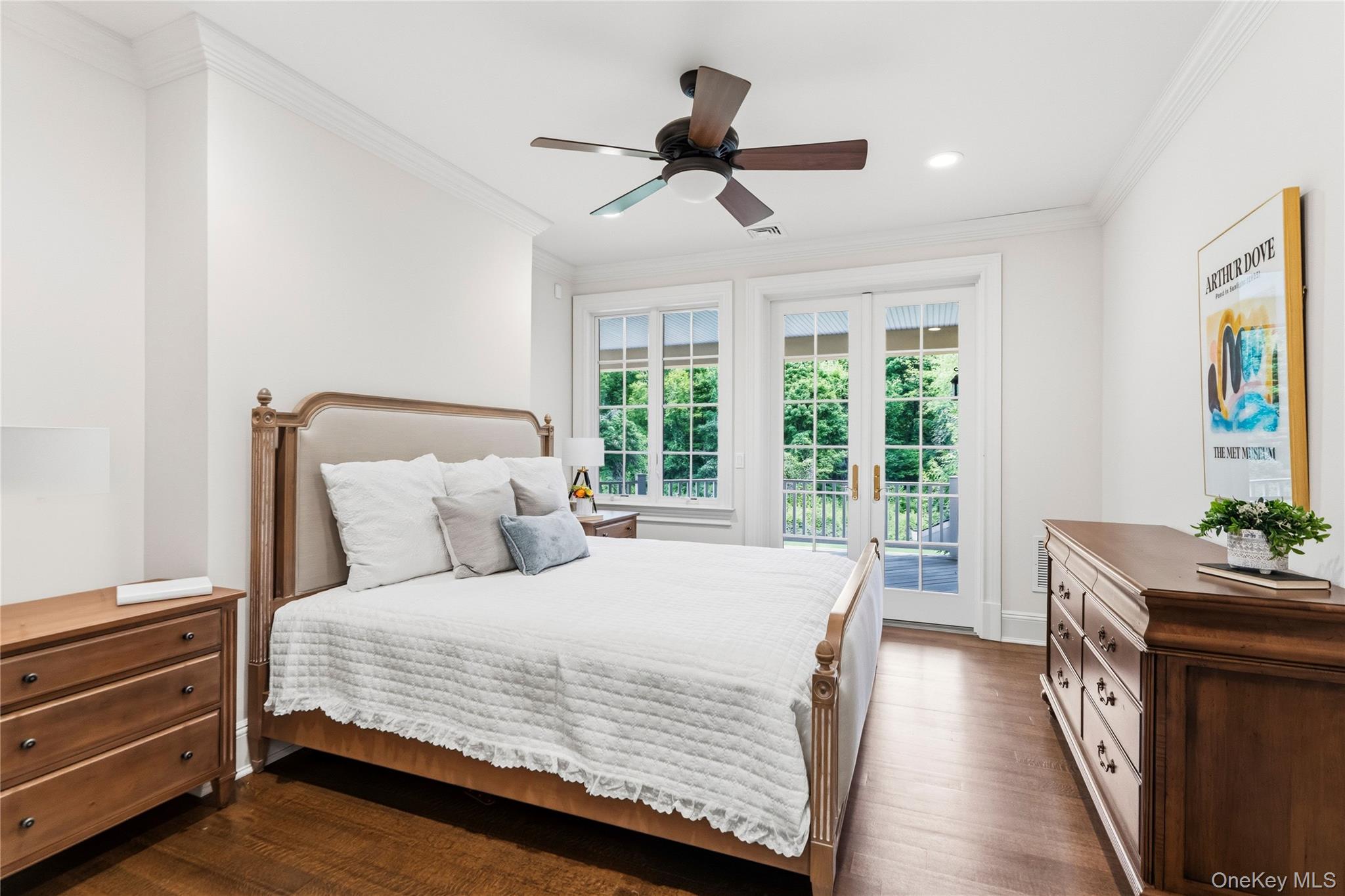 1960 Midlane Road South Syosset, NY 11791 - Photo 32 of 46 a bedroom with a bed and a table