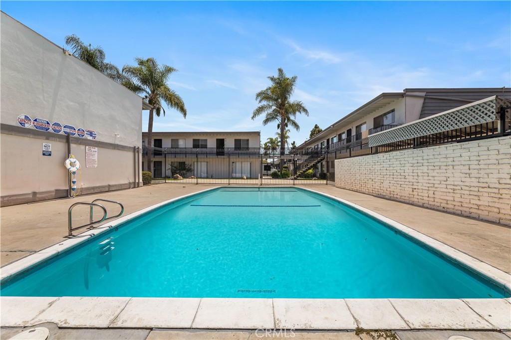 5530 Ackerfield Avenue, Unit 206 Long Beach, CA 90805 - Photo 26 of 33 a view of outdoor space and swimming pool