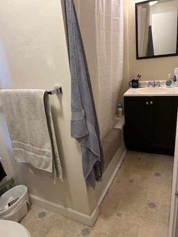 31 Goddard Street Webster, MA 01570 - Photo 11 of 31 a bathroom with a sink and mirror with toilet