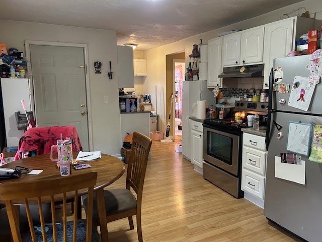 31 Goddard Street Webster, MA 01570 - Photo 12 of 31 a view of a dining room with furniture and wooden floor