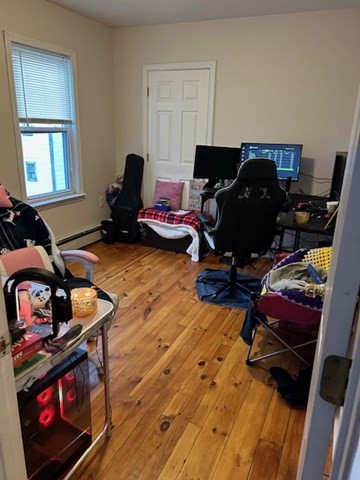 31 Goddard Street Webster, MA 01570 - Photo 22 of 31 a view of a workspace with furniture and gym equipment