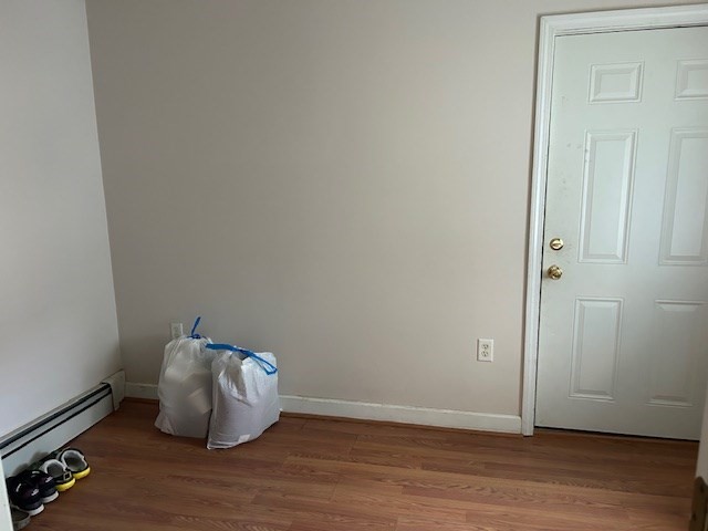 31 Goddard Street Webster, MA 01570 - Photo 23 of 31 a room with wooden floor and glass door