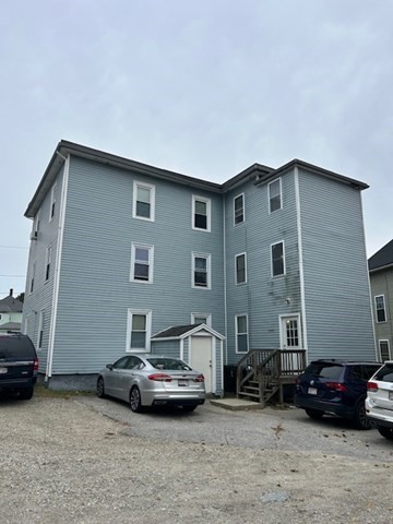 31 Goddard Street Webster, MA 01570 - Photo 29 of 31 a car parked in front of a house