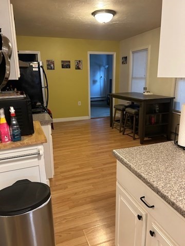 31 Goddard Street Webster, MA 01570 - Photo 6 of 31 a kitchen with stainless steel appliances granite countertop a sink stove and cabinets