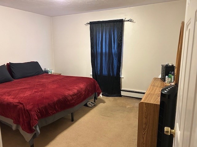 31 Goddard Street Webster, MA 01570 - Photo 8 of 31 a bedroom with a bed and a closet