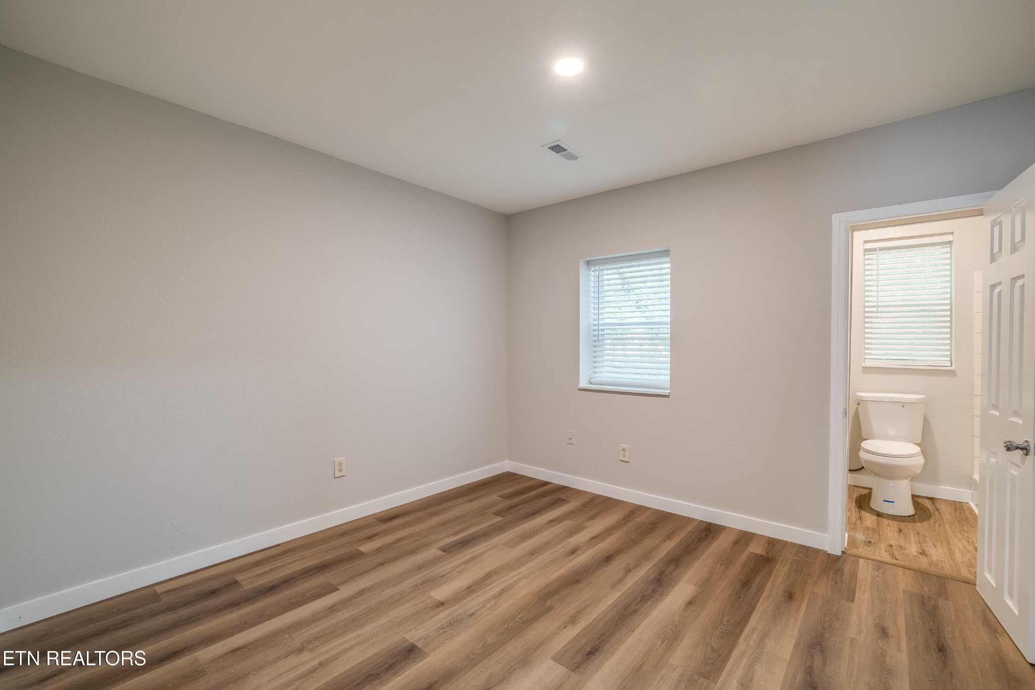 4707 Wildwood Road Maryville, TN 37804 - Photo 11 of 18 a view of empty room with wooden floor