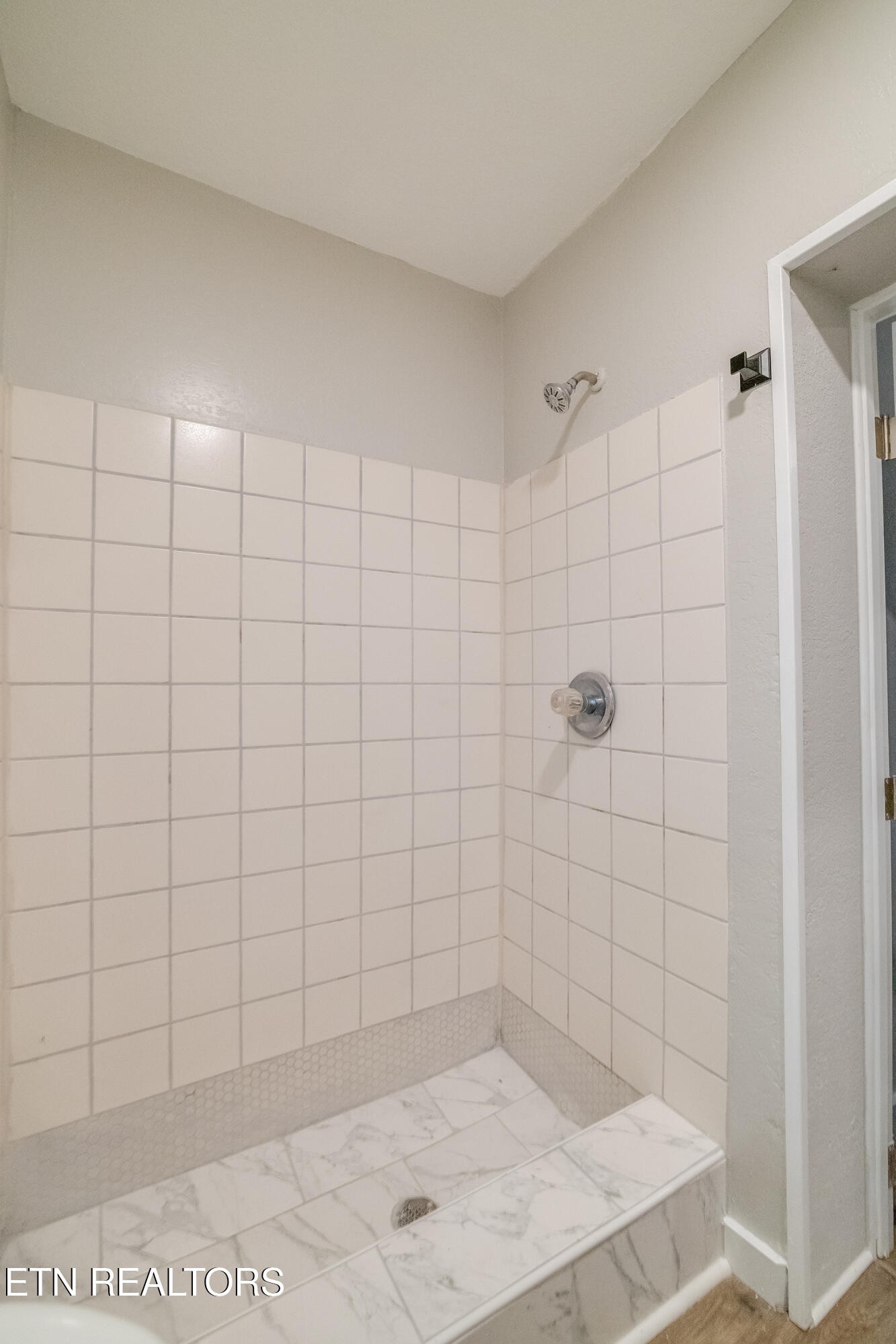 4707 Wildwood Road Maryville, TN 37804 - Photo 14 of 18 a bathroom with a shower
