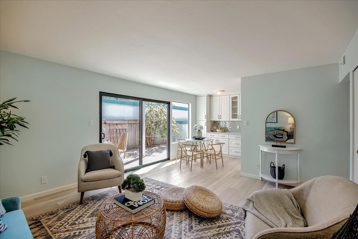 1925 46th Avenue, Unit 149 Capitola, CA 95010 - Photo 3 of 24 a living room with furniture and wooden floor