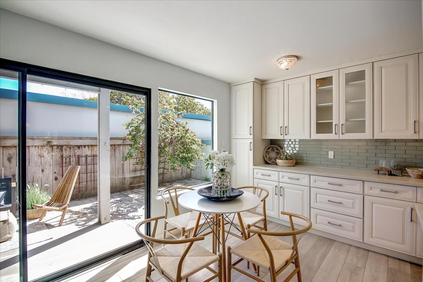 1925 46th Avenue, Unit 149 Capitola, CA 95010 - Photo 10 of 24 a kitchen with stainless steel appliances granite countertop a stove a sink and cabinets
