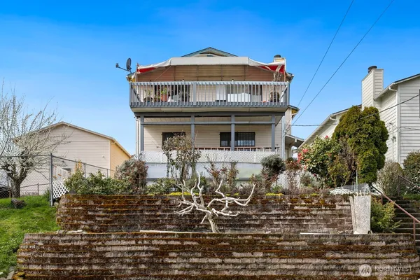 a front view of a house with yard