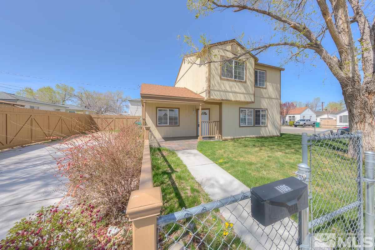 1105 Locust Street Reno, NV 89502 - Photo 1 of 1 a front view of a house with garden
