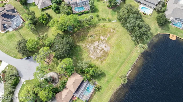 a view of a yard from a balcony