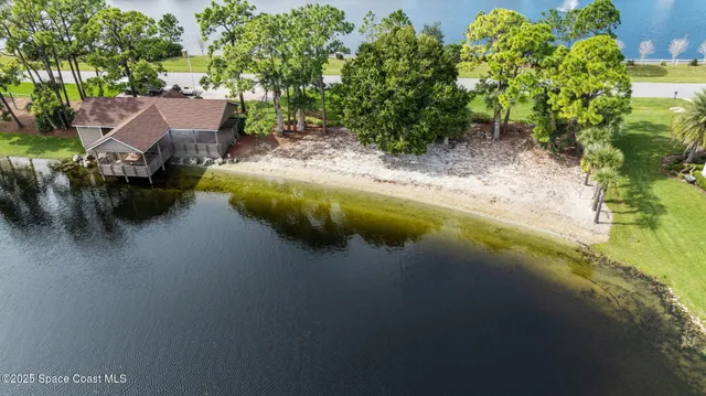 a view of a garden with a lake