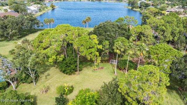 a view of a large building with a yard