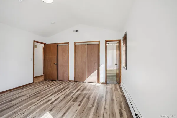 a view of hallway with closet