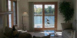 7280 North Alpine Road, Unit 2N Loves Park, IL 61111 - Photo 4 of 6 a room with furniture and a window
