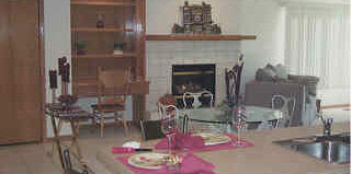 7280 North Alpine Road, Unit 2N Loves Park, IL 61111 - Photo 6 of 6 a view of a livingroom with furniture and a fireplace