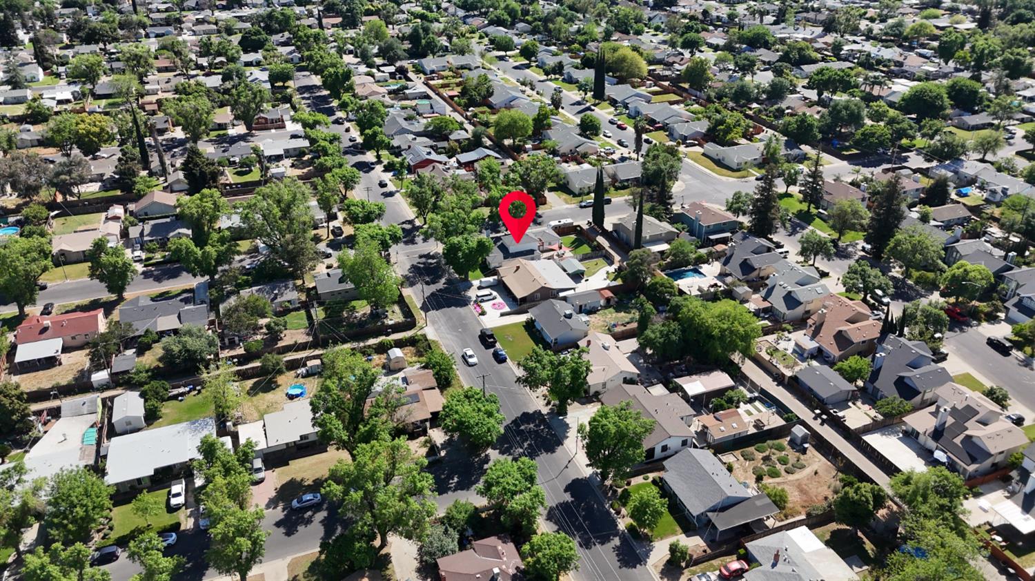 401 Fortuna Avenue Modesto, CA 95354 - Photo 42 of 43 an aerial view of residential houses with outdoor space and covered with trees