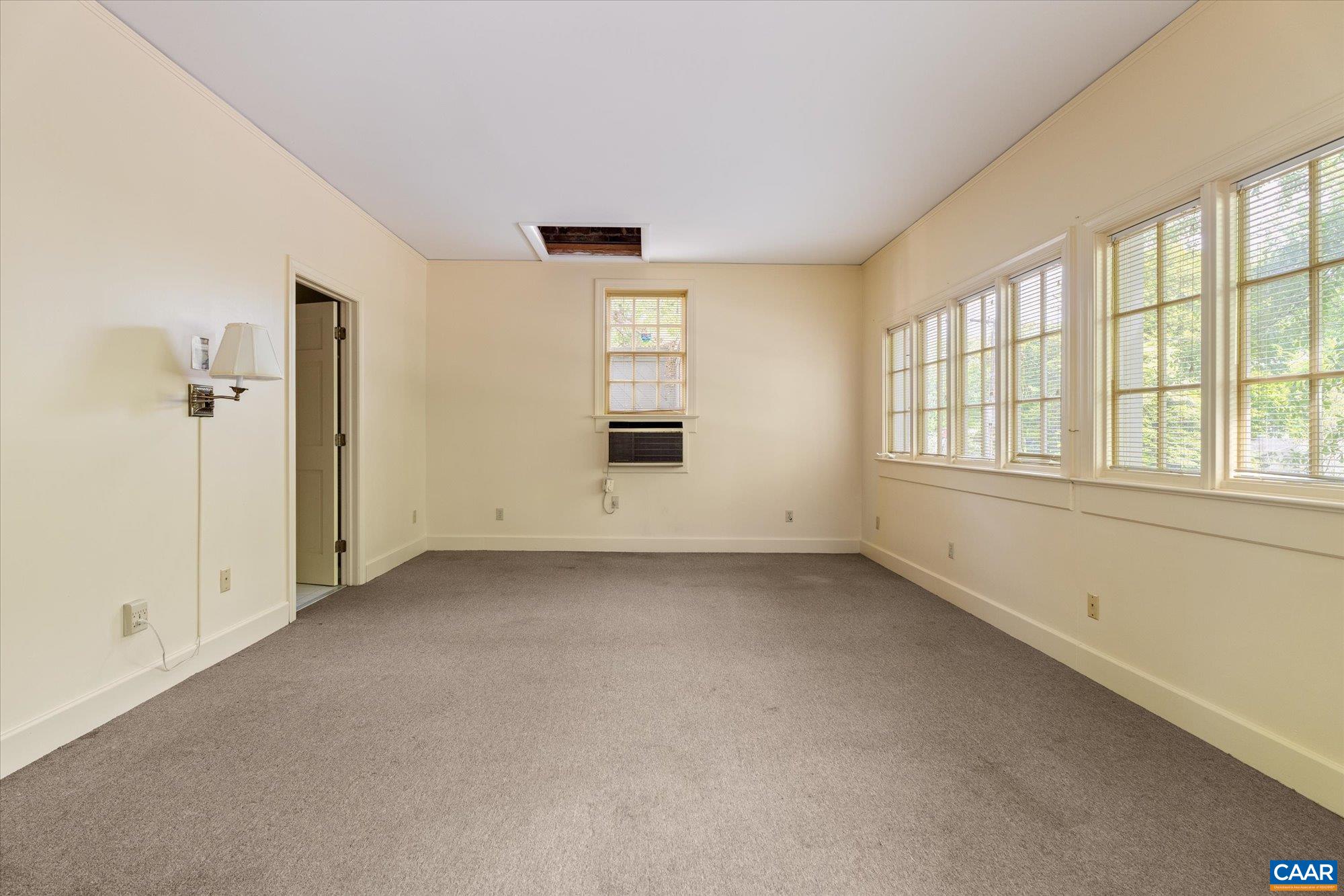 2001 Thomson Road Charlottesville, VA 22903 - Photo 47 of 54 an empty room with a empty space and windows