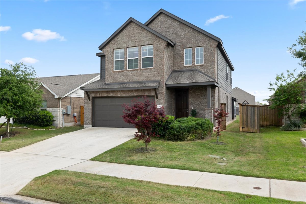 321 Buffalo View Lane Georgetown, TX 78628 - Photo 28 of 29 Beautiful brick exterior with dark trim and a covered front entry