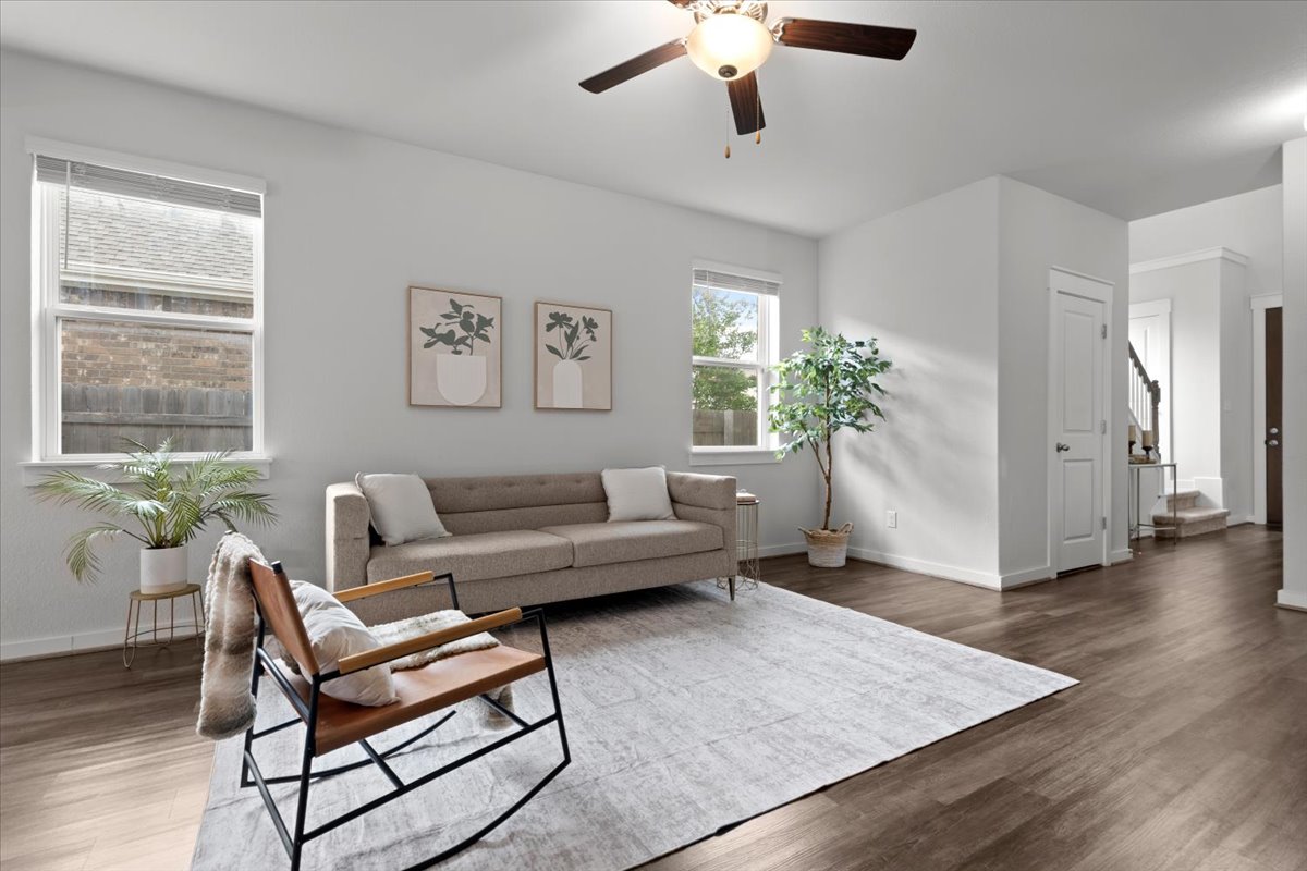 321 Buffalo View Lane Georgetown, TX 78628 - Photo 3 of 29 Spacious living area featuring high ceilings, recessed lighting, and vinyl flooring throughout