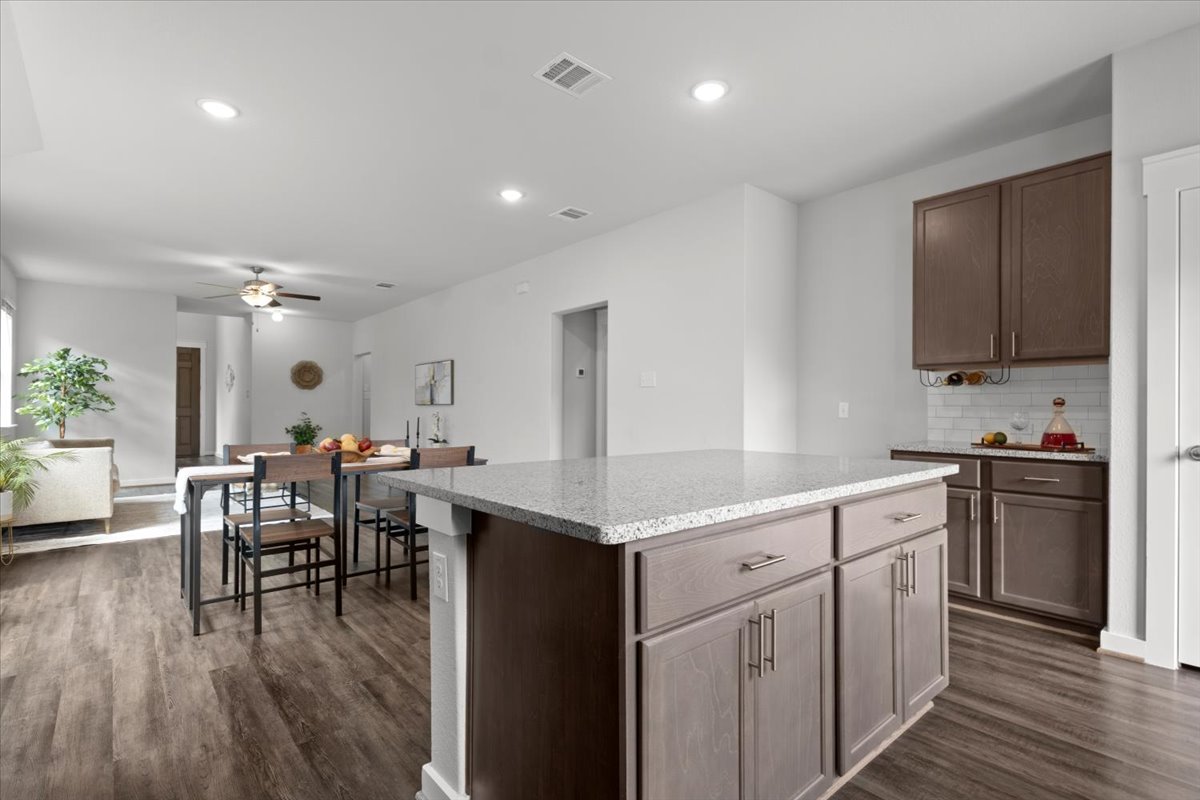 321 Buffalo View Lane Georgetown, TX 78628 - Photo 10 of 29 Large central island equipped with electrical outlets for food easy food prep