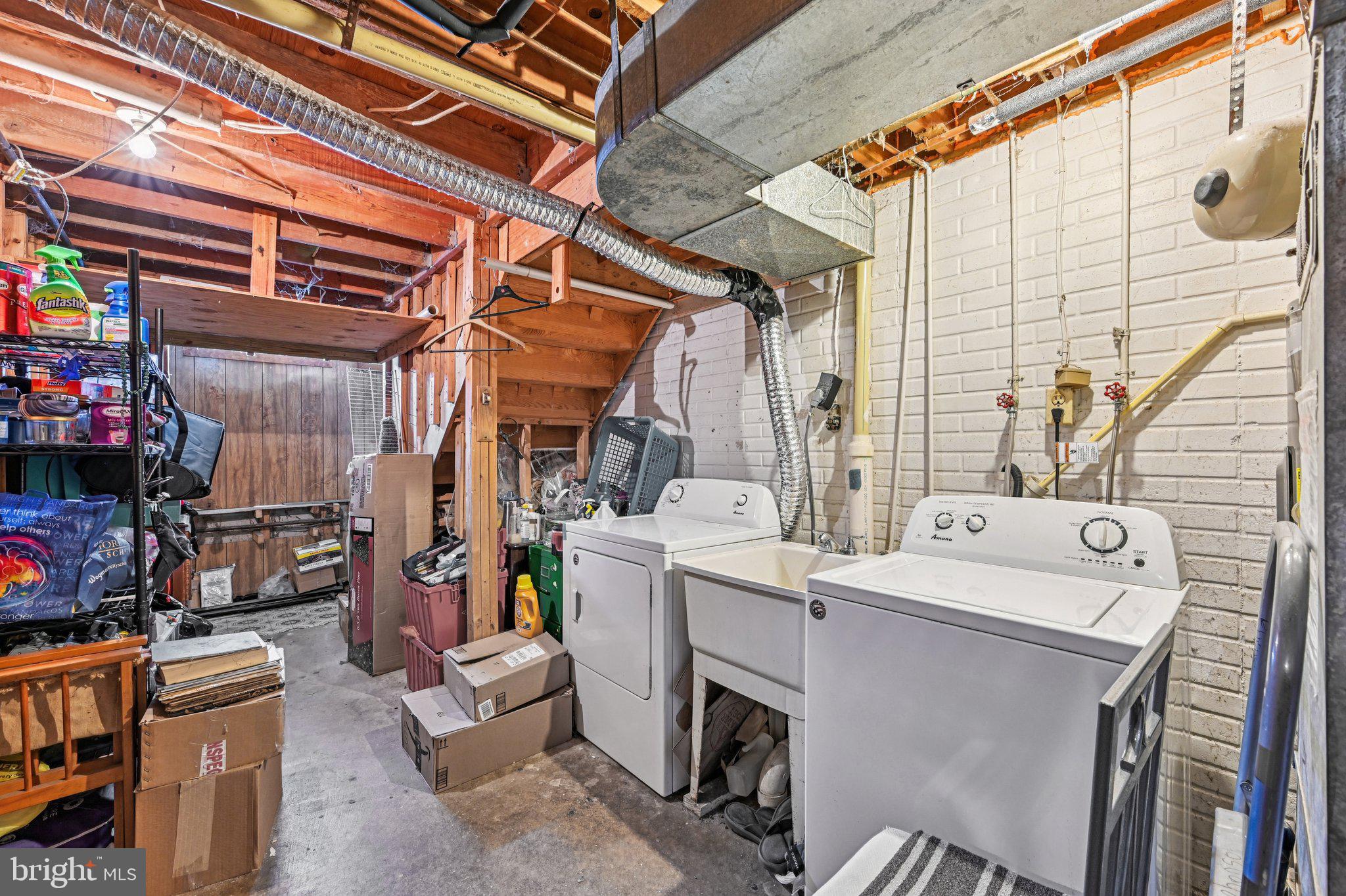 32 Coliston Road, Unit B Reisterstown, MD 21136 - Photo 22 of 24 a utility room with dryer and washer