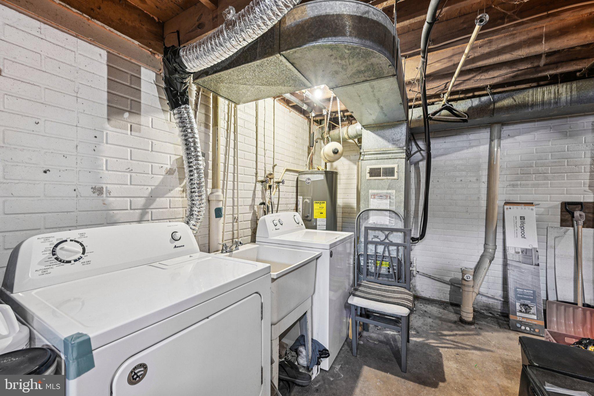 32 Coliston Road, Unit B Reisterstown, MD 21136 - Photo 23 of 24 a utility room with dryer and washer