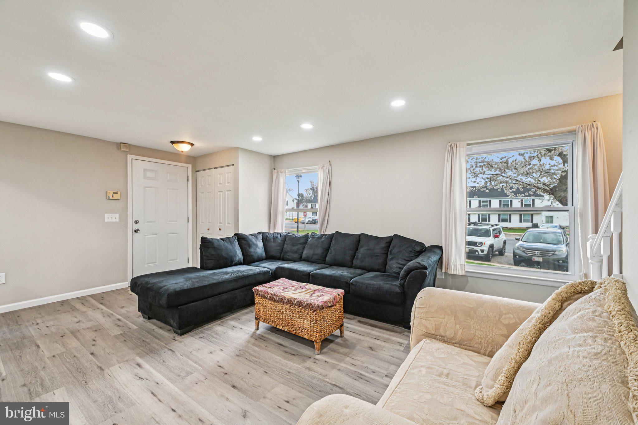 32 Coliston Road, Unit B Reisterstown, MD 21136 - Photo 5 of 24 a living room with furniture and a large window