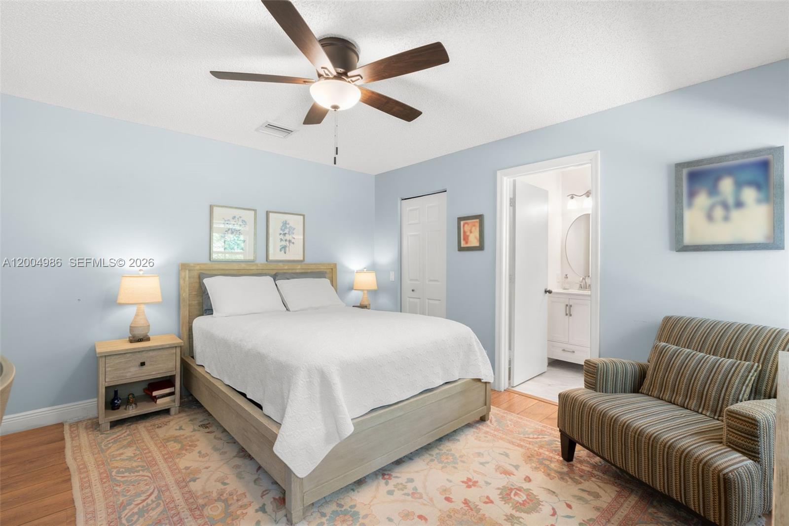 4108 Pine Ridge Lane Weston, FL 33331 - Photo 17 of 37 a bedroom with a bed couch and window
