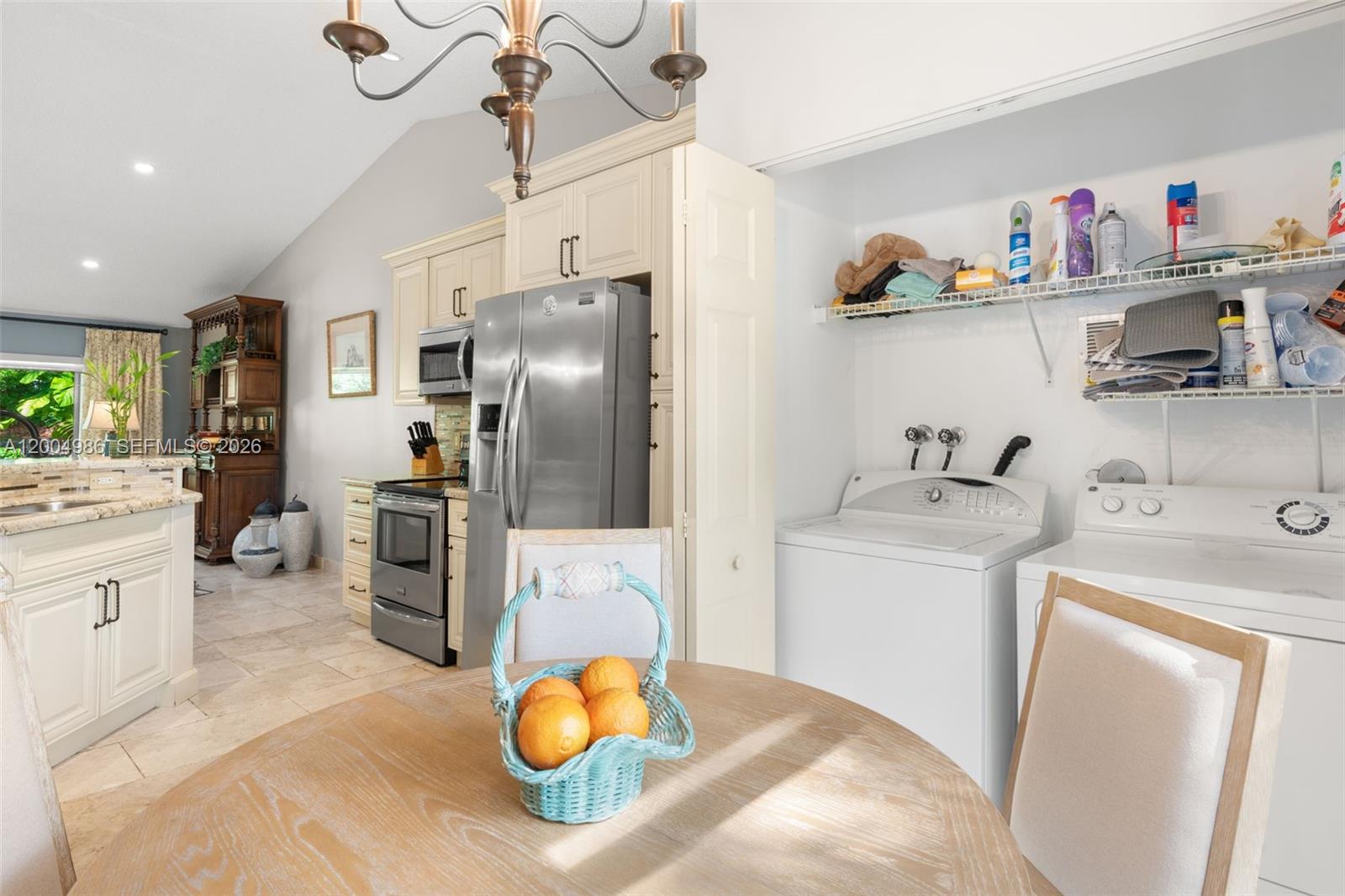 4108 Pine Ridge Lane Weston, FL 33331 - Photo 8 of 37 a kitchen with stainless steel appliances granite countertop a sink a stove a refrigerator and cabinets