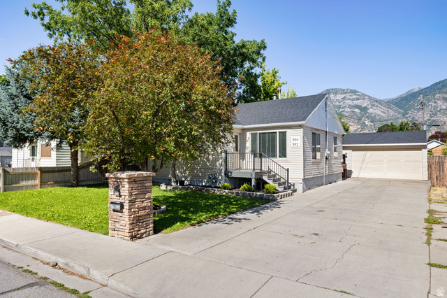 594 850 West Provo, UT 84601 - Photo 33 of 33 Ranch-style exterior with light-colored siding and a dark shingle roof