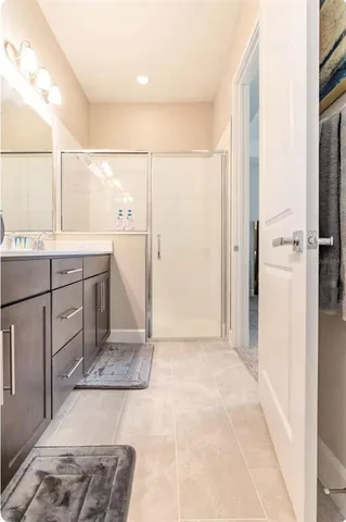 a bathroom with a tub and shower