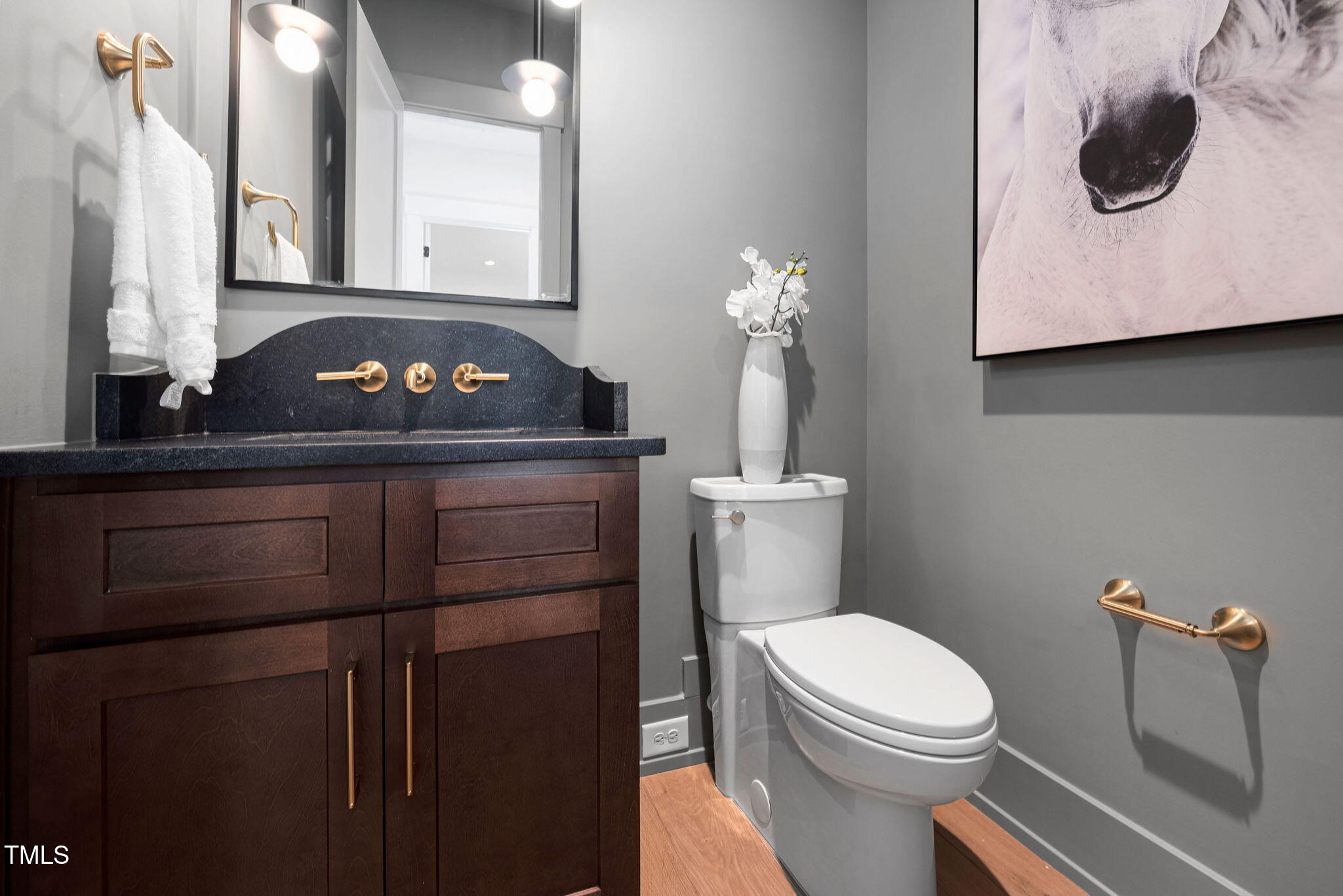 604 Edmund Street Raleigh, NC 27604 - Photo 18 of 70 a bathroom with a toilet a sink and bathtub