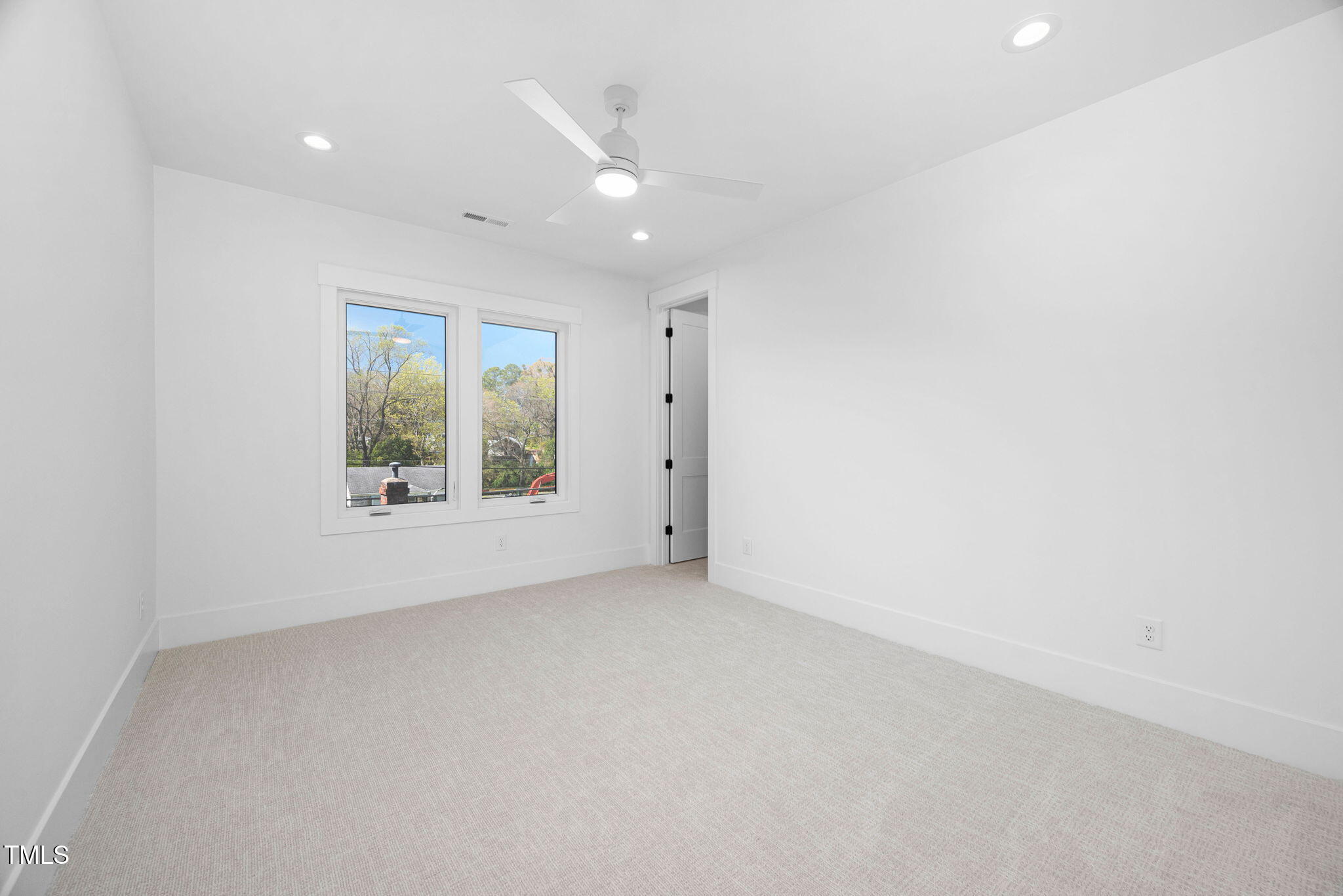 604 Edmund Street Raleigh, NC 27604 - Photo 39 of 70 an empty room with windows and closet