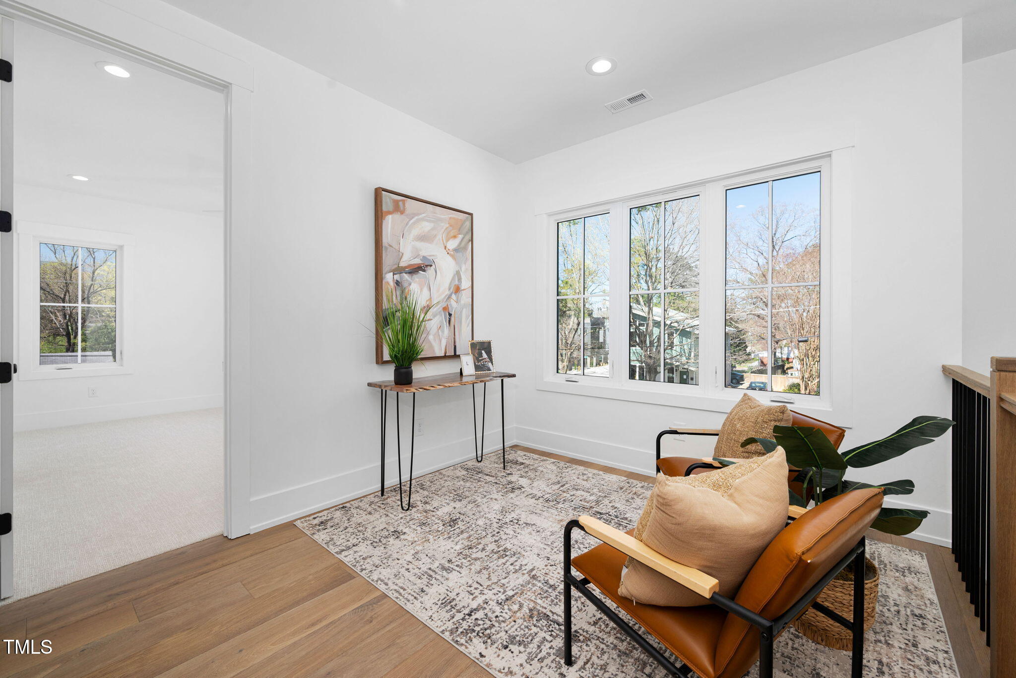 604 Edmund Street Raleigh, NC 27604 - Photo 47 of 70 a living room with furniture and a large window